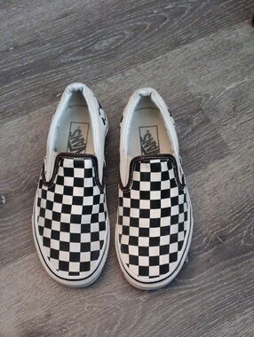 Vans Black & White Checkerboard Slip-On Sneakers
